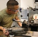 445th Maintenance Squadron tech works with precision