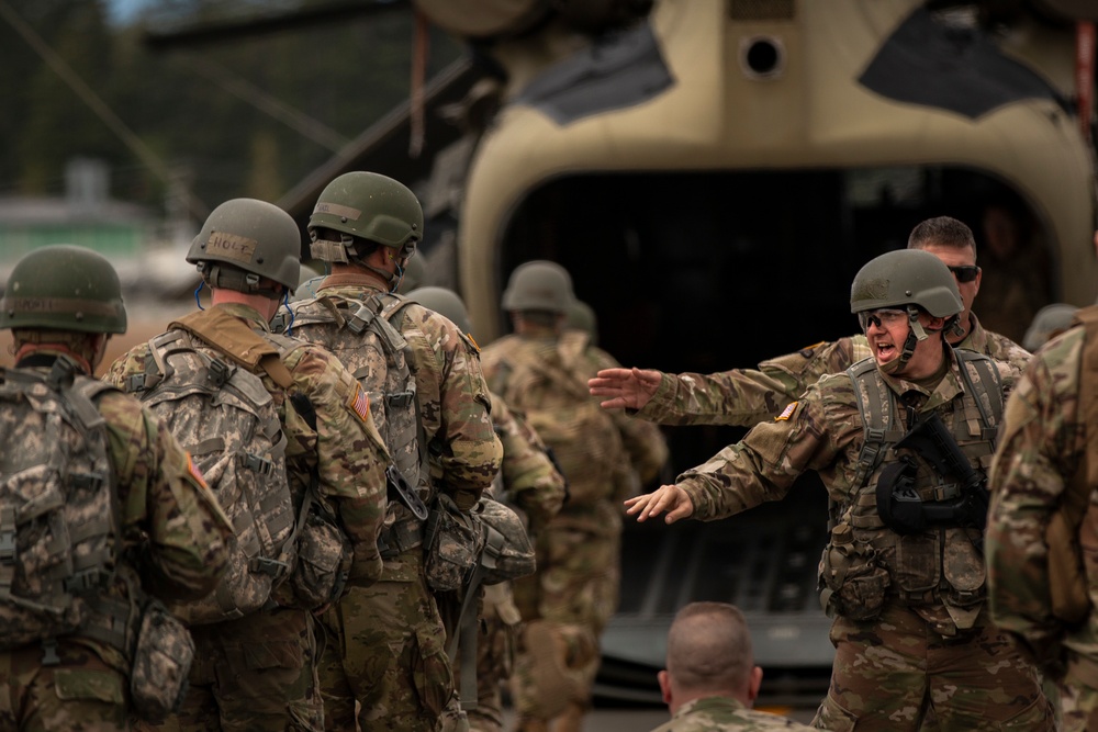 Prepare for departure: Army National Guard officer candidates prep for air infiltration during Officer Candidate School Phase III