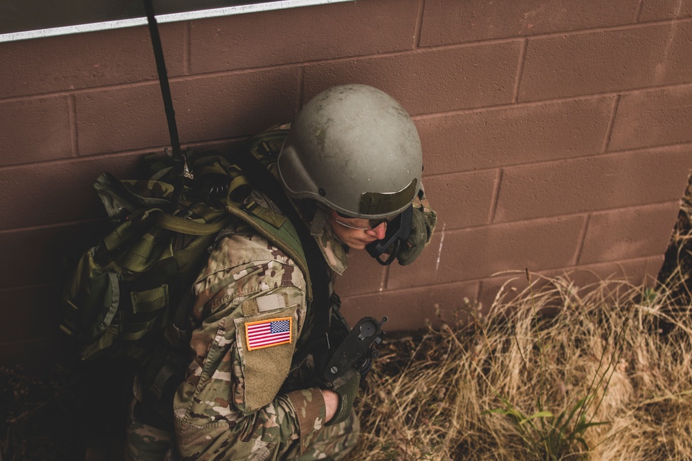 Practice makes leaders: Army National Guard officer candidates raid Leschi Town during OCS Phase III