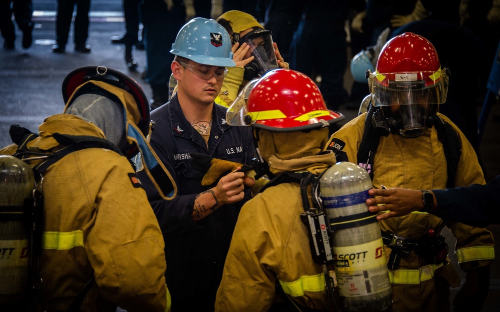 USS Carl Vinson (CVN 70) Sailors Conduct Fire Casualty Drill with San Diego Federal Fire Department