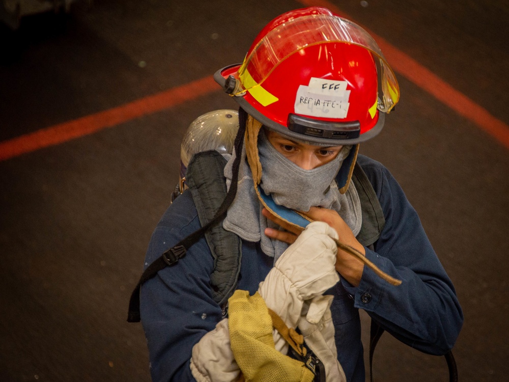 USS Carl Vinson (CVN 70) Sailors Conduct Fire Casualty Drill with San Diego Federal Fire Department