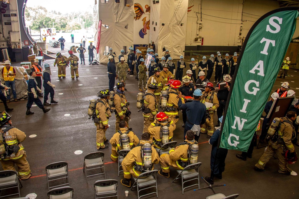 USS Carl Vinson (CVN 70) Sailors Conduct Fire Casualty Drill with San Diego Federal Fire Department