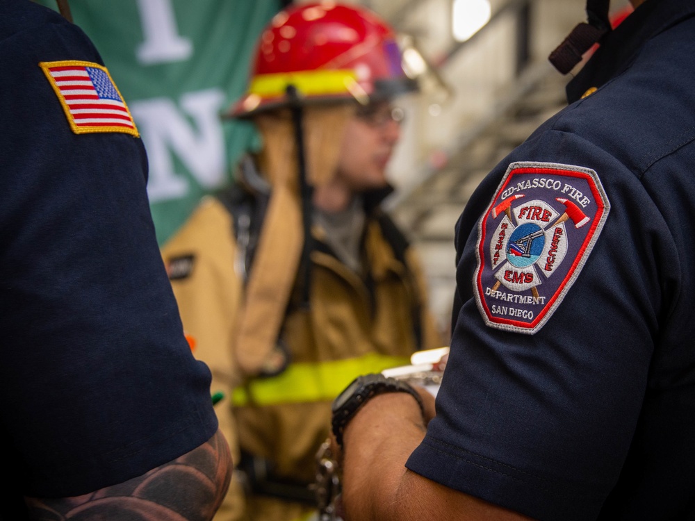 USS Carl Vinson (CVN 70) Sailors Conduct Fire Casualty Drill with San Diego Federal Fire Department