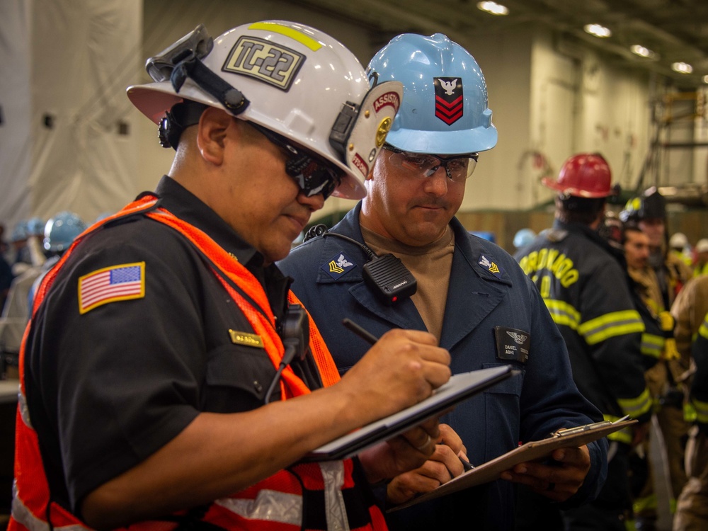 USS Carl Vinson (CVN 70) Sailors Conduct Fire Casualty Drill with San Diego Federal Fire Department