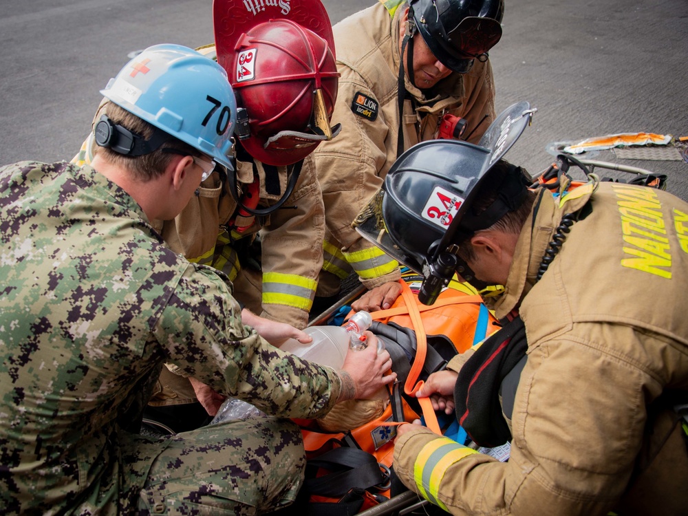 USS Carl Vinson (CVN 70) Sailors Conduct Fire Casualty Drill with San Diego Federal Fire Department