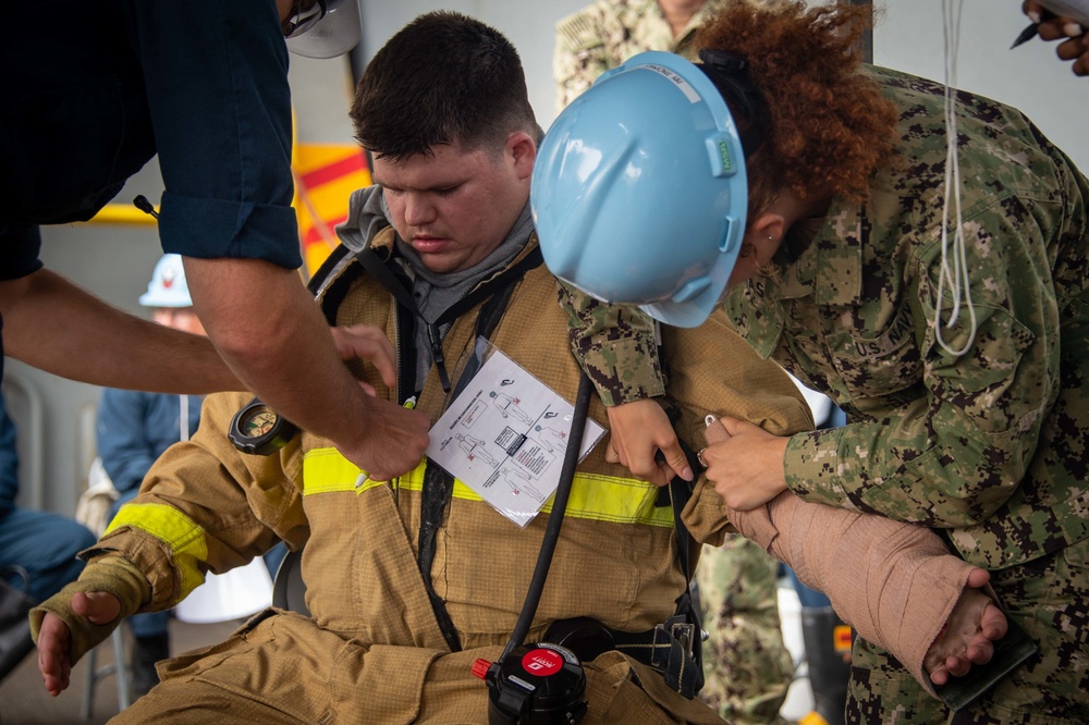 USS Carl Vinson (CVN 70) Sailors Conduct Fire Casualty Drill with San Diego Federal Fire Department