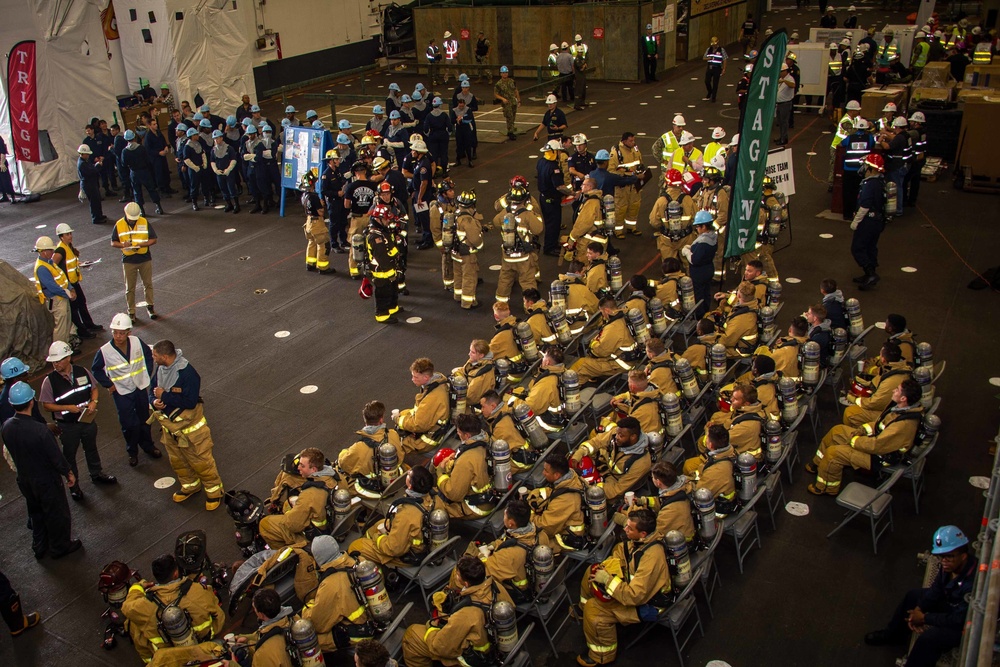 USS Carl Vinson (CVN 70) Sailors Conduct Fire Casualty Drill with San Diego Federal Fire Department