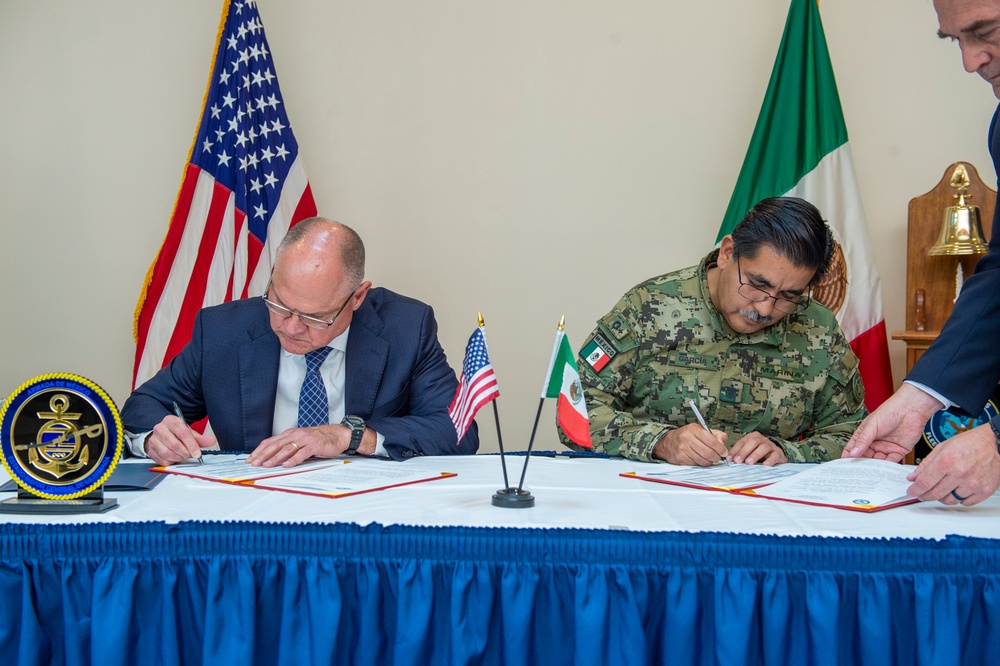 Rear Adm. Arturo García Fernández, Mexican Navy, chief of logistics section of the general staff of the Navy, meets with Mr. Robert Lain, U.S. Marine Corps Forces Command, head of logistics operations, to sign a memorandum of understanding.