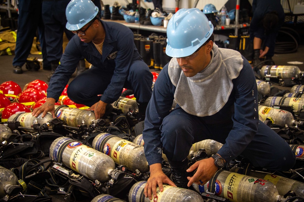 USS Carl Vinson (CVN 70) Sailors Conduct Fire Casualty Drill with San Diego Federal Fire Department