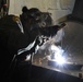 Coast Guard Cutter Healy crewmember welding