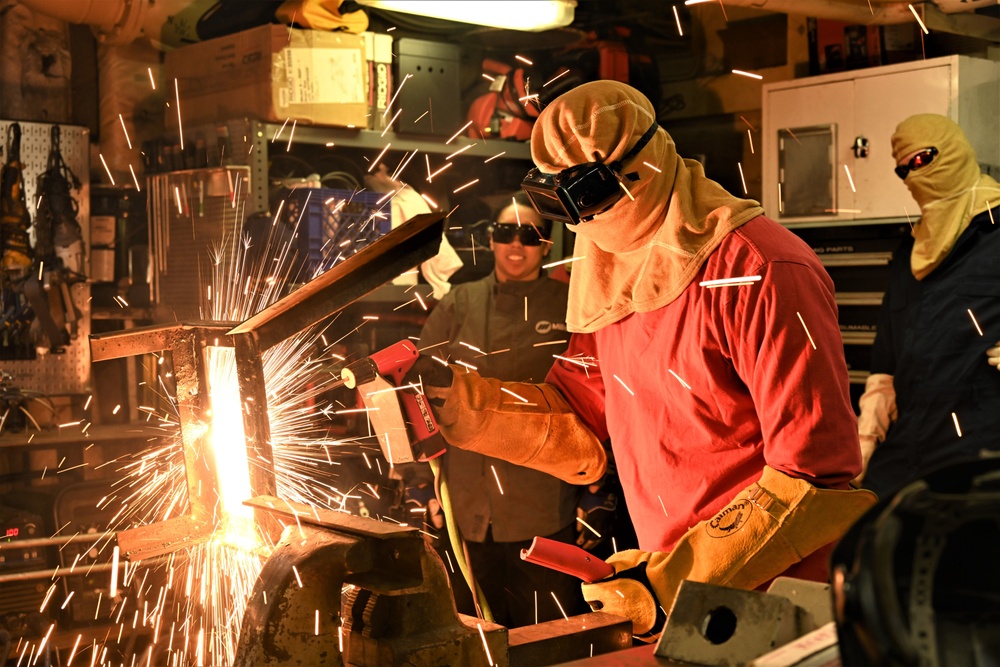 Coast Guard Cutter Healy crew members conduct damage control training underway