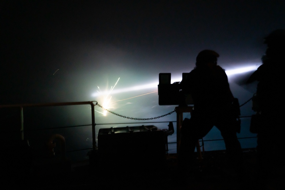 USCG Fast Response Cutter John Scheuerman (WPC 1146) conduct nighttime live fire GUNNEX