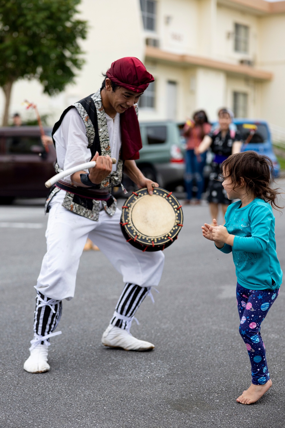 Jaagaru Eisa Group performs an Eisa march through military housing