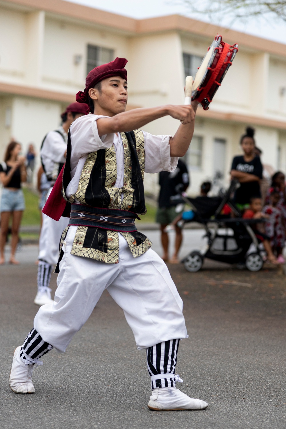 Jaagaru Eisa Group performs an Eisa march through military housing