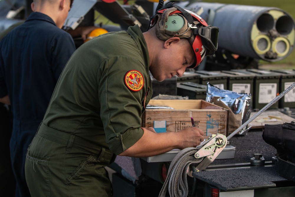 New Tricks For An Old Dog: Marines with VMA-223 load Air-to-Air missiles onto Harriers