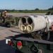 New Tricks For An Old Dog: Marines with VMA-223 load Air-to-Air missiles onto Harriers