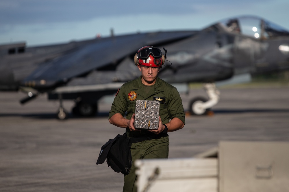 New Tricks For An Old Dog: Marines with VMA-223 load Air-to-Air missiles onto Harriers