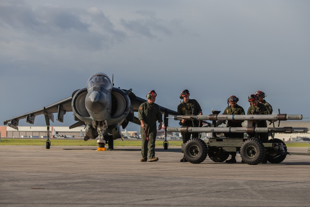 New Tricks For An Old Dog: Marines with VMA-223 load Air-to-Air missiles onto Harriers