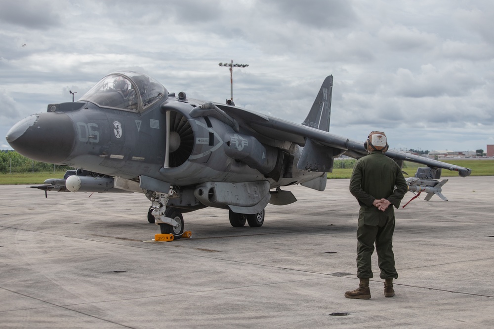 New Tricks For An Old Dog: Marines with VMA-223 load Air-to-Air missiles onto Harriers