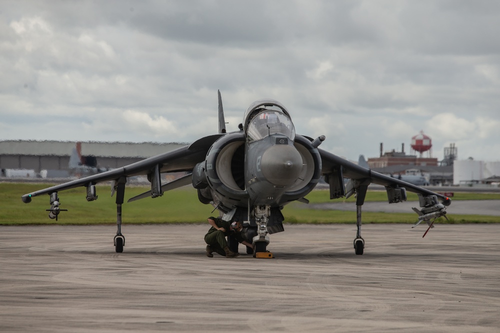 New Tricks For An Old Dog: Marines with VMA-223 load Air-to-Air missiles onto Harriers