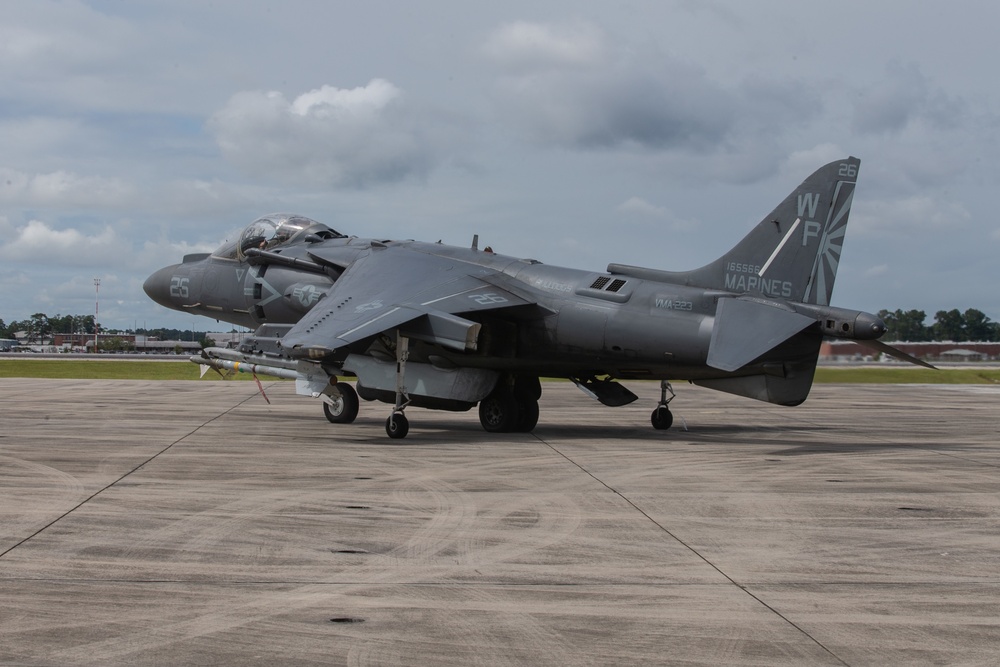 New Tricks For An Old Dog: Marines with VMA-223 load Air-to-Air missiles onto Harriers