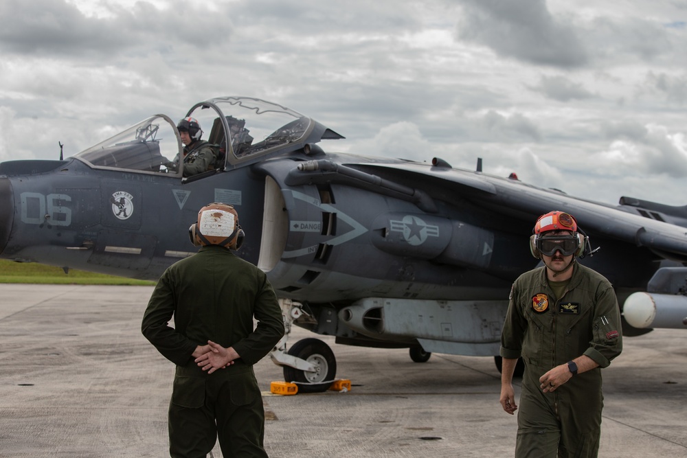 New Tricks For An Old Dog: Marines with VMA-223 load Air-to-Air missiles onto Harriers