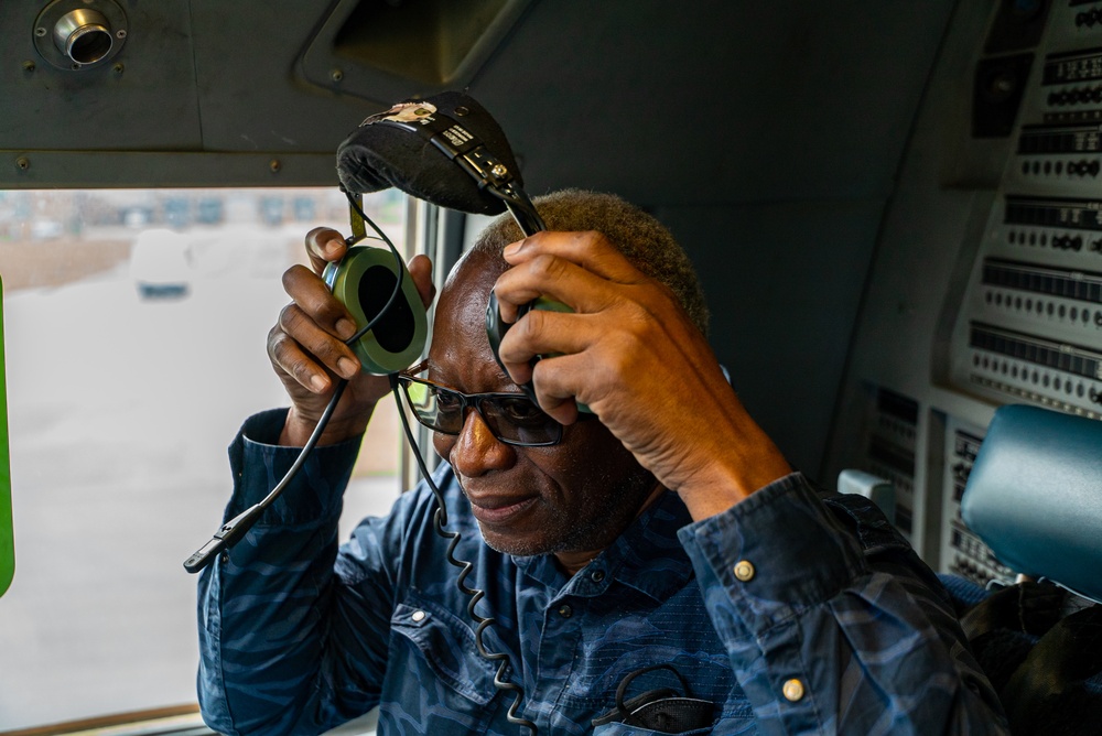 Local mayor visits AMC training field, catches a ride on C-17