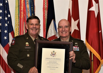 Retiring AMC operations officer recognized for leadership during major world events