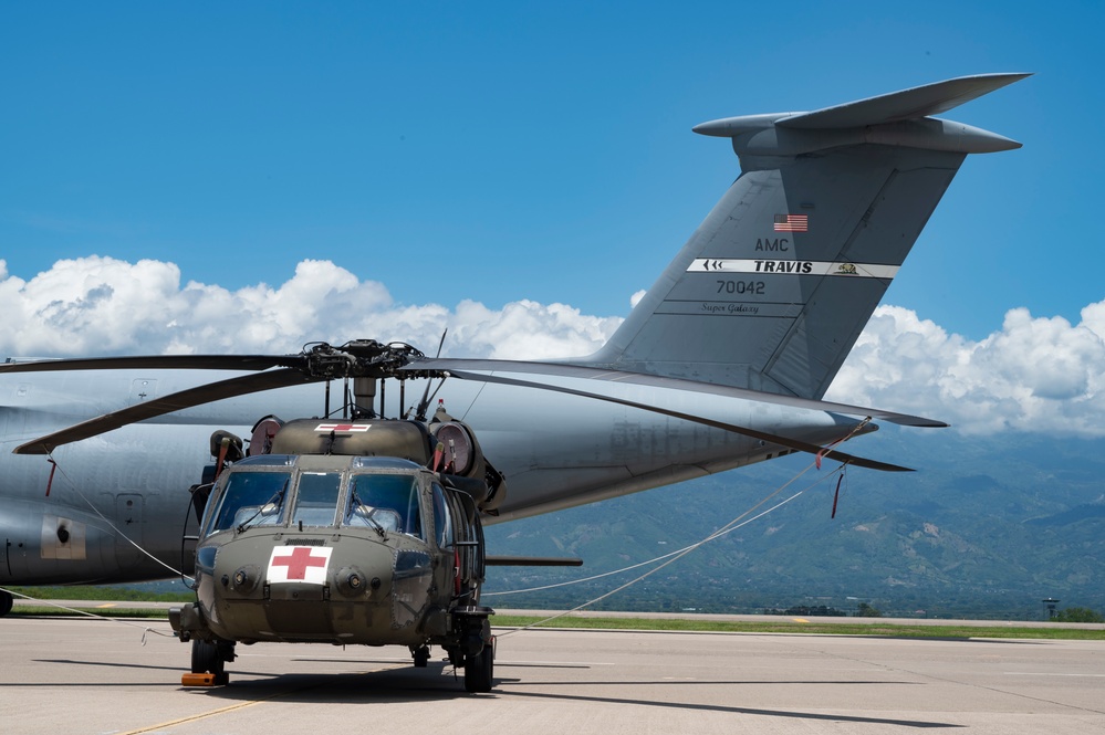612th Air Base Squadron receives C-5M Super Galaxy Denton Cargo shipment from Travis Air Force Base