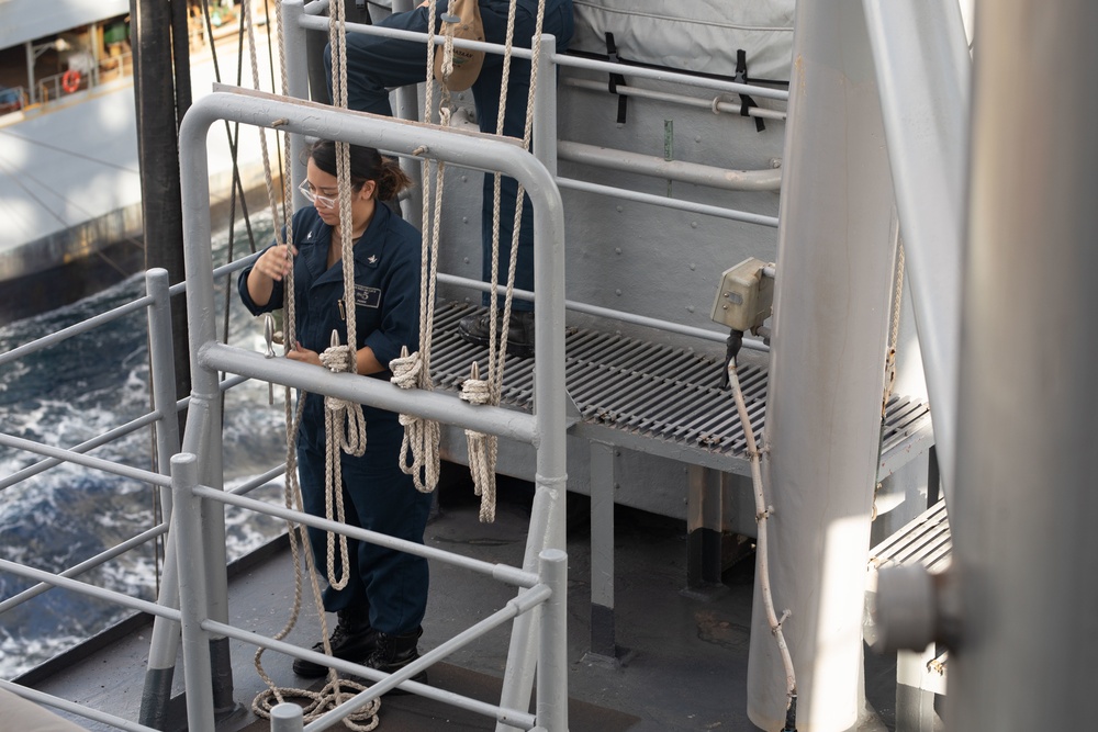 USS Bataan Sailors perform replenishment at sea