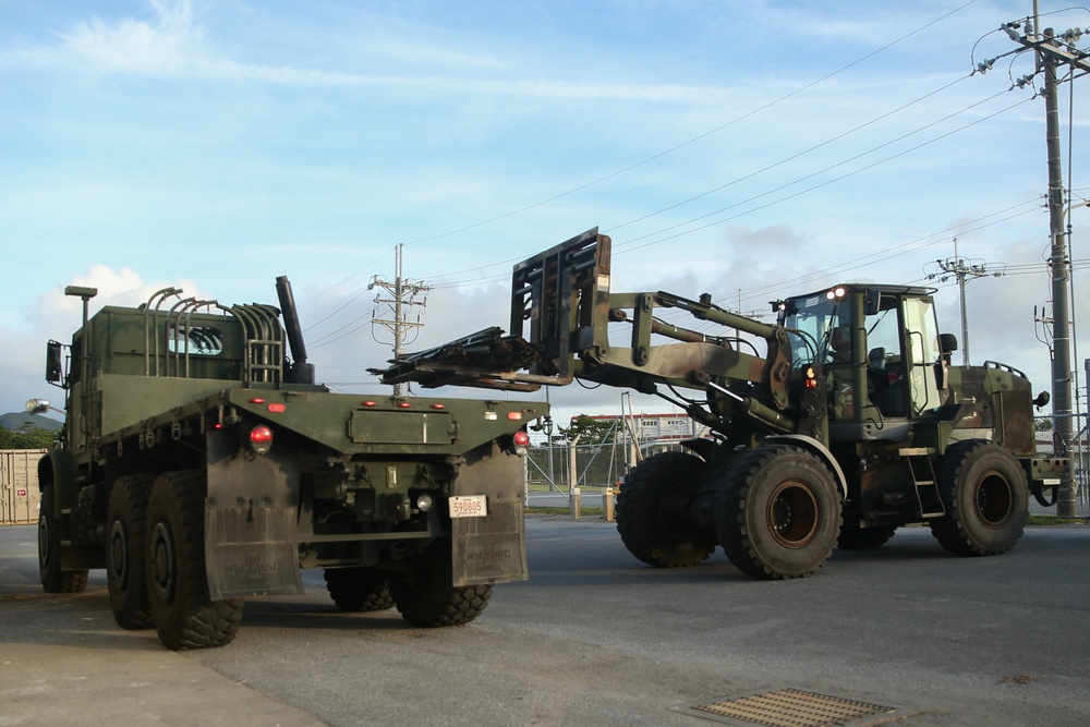 Marines with Combat Logistics Battalion 4 load and transport quadcons