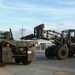 Marines with Combat Logistics Battalion 4 load and transport quadcons