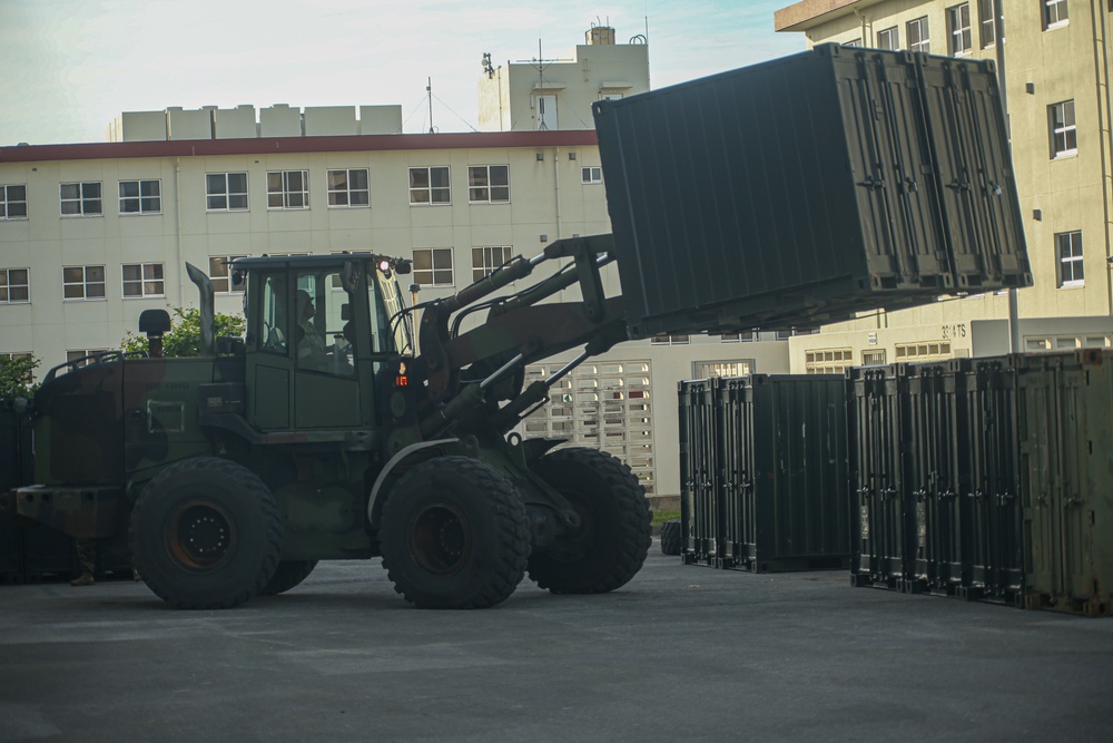 Marines with Combat Logistics Battalion 4 load and transport quadcons