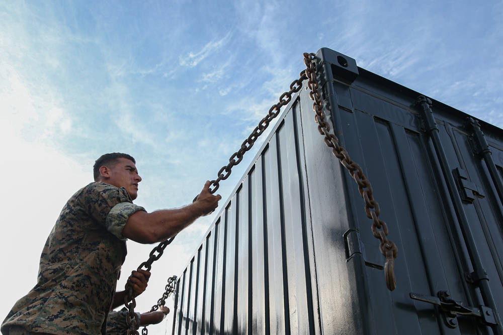 Marines with Combat Logistics Battalion 4 load and transport quadcons