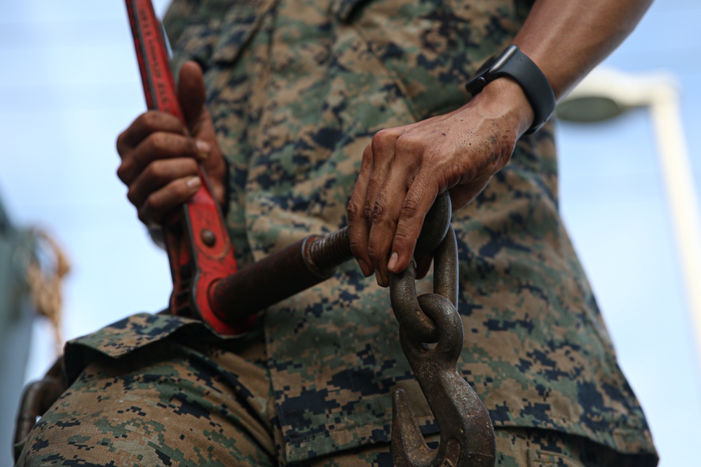 Marines with Combat Logistics Battalion 4 load and transport quadcons