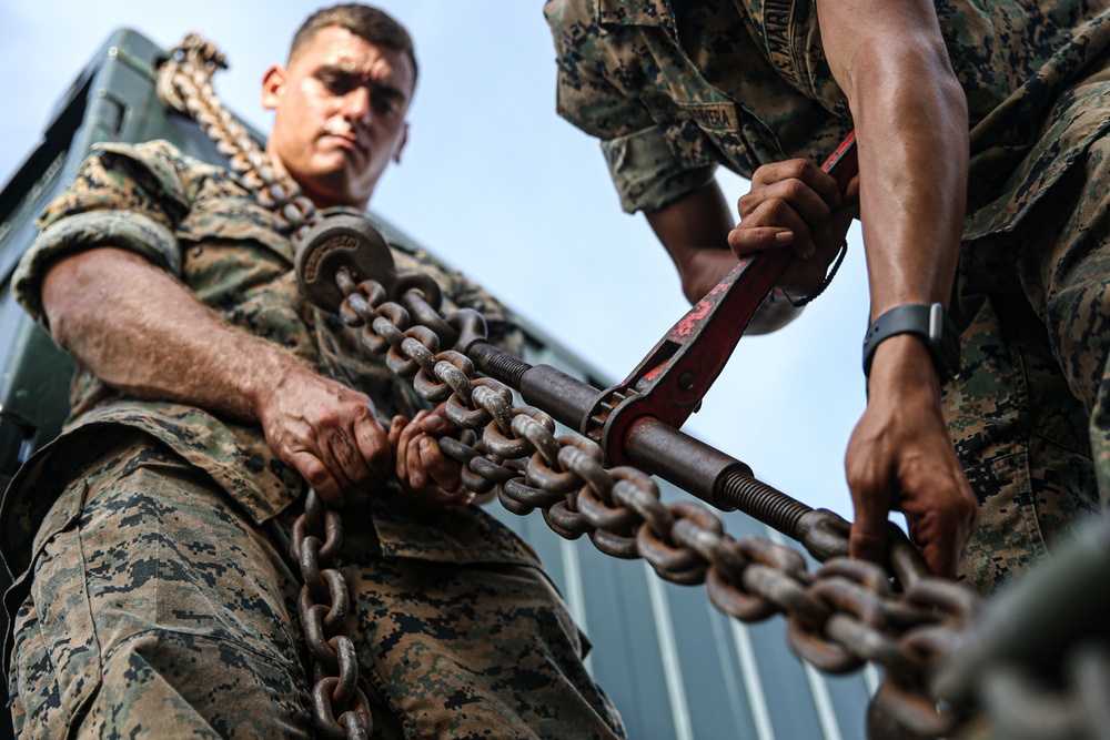 Marines with Combat Logistics Battalion 4 load and transport quadcons