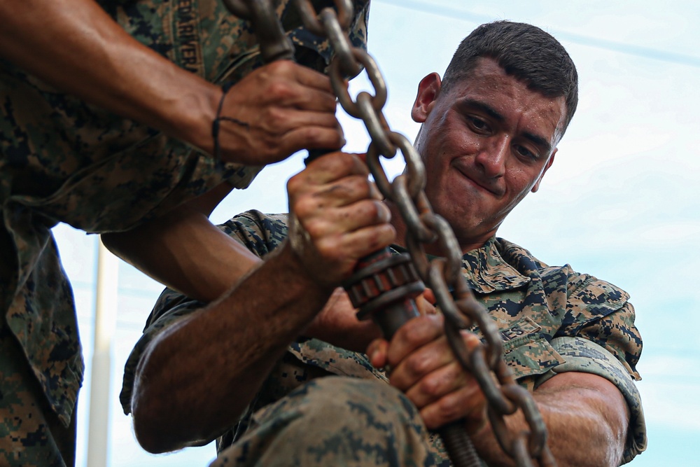 Marines with Combat Logistics Battalion 4 load and transport quadcons