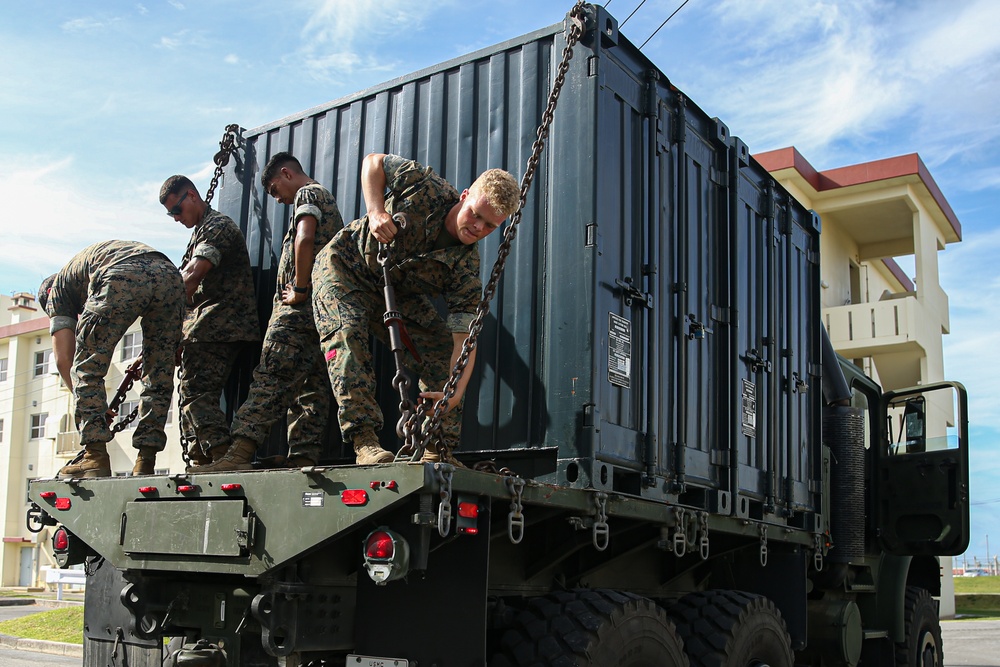Marines with Combat Logistics Battalion 4 load and transport quadcons