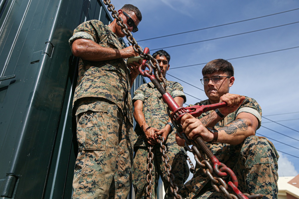 Marines with Combat Logistics Battalion 4 load and transport quadcons