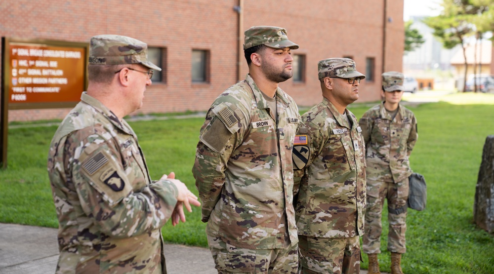 Two HHC Soldiers from 1st Signal Brigade get promoted