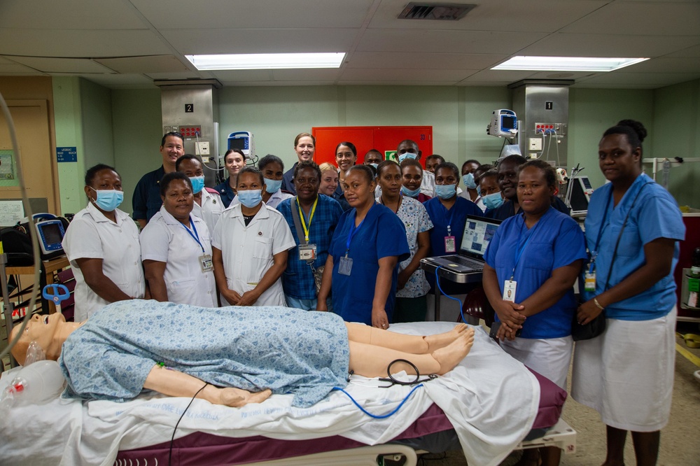 U.S. Navy Sailors, Solomon Islands nurses practice nursing skills aboard USNS Mercy