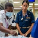 U.S. Navy Sailors, Solomon Islands nurses practice nursing skills aboard USNS Mercy