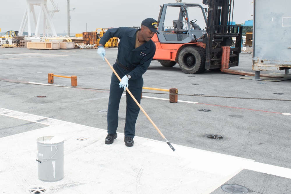 USS Ronald Reagan (CVN 76) Sailors perform work on the flight deck