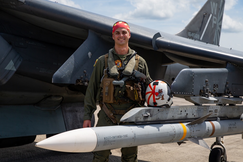 New Tricks For An Old Dog: Marines with VMA-223 load Air-to-Air missiles onto Harriers