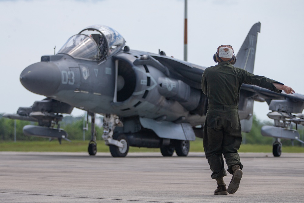 New Tricks For An Old Dog: Marines with VMA-223 load Air-to-Air missiles onto Harriers