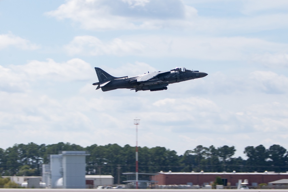 New Tricks For An Old Dog: Marines with VMA-223 load Air-to-Air missiles onto Harriers