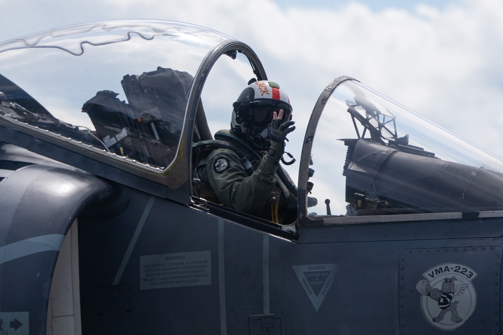 New Tricks For An Old Dog: Marines with VMA-223 load Air-to-Air missiles onto Harriers