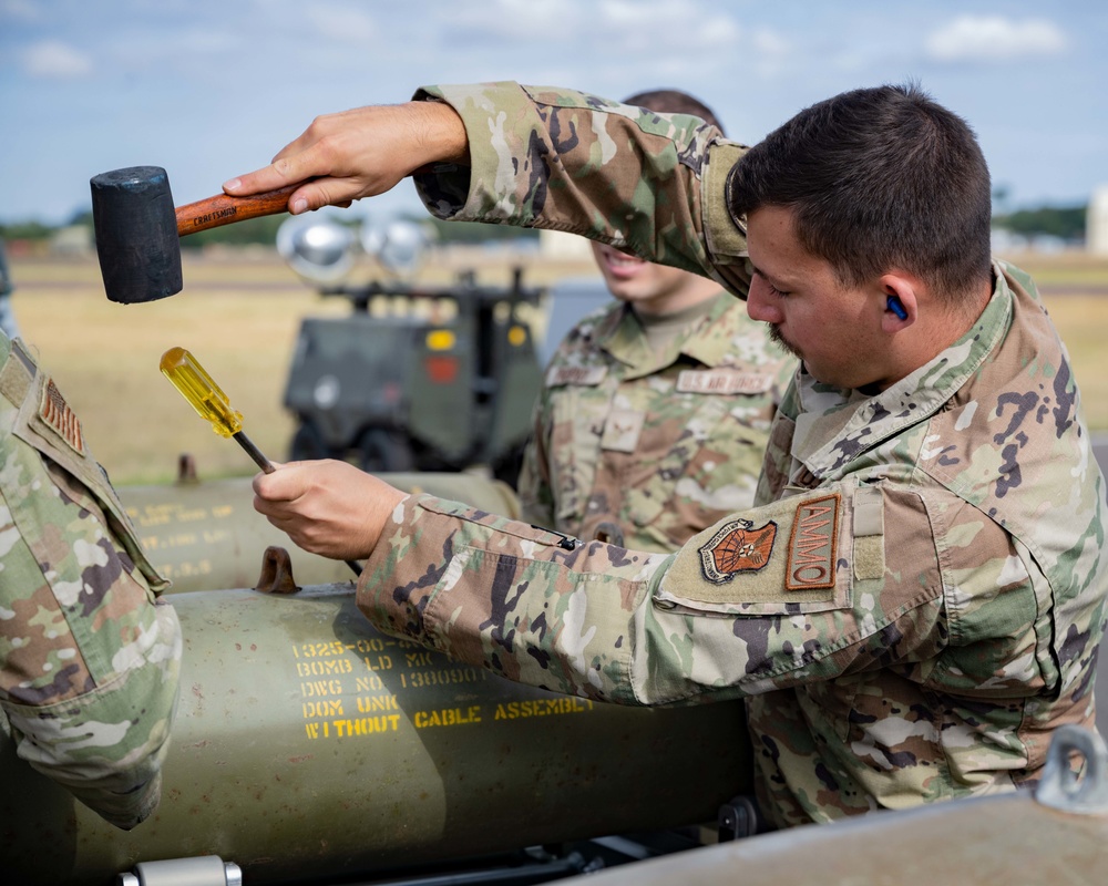 23rd Aircraft Maintenance Unit Aircraft Armament Systems Specialists and 5th Munitions Squadron Munitions Systems Maintenance Specialists Build Munitions