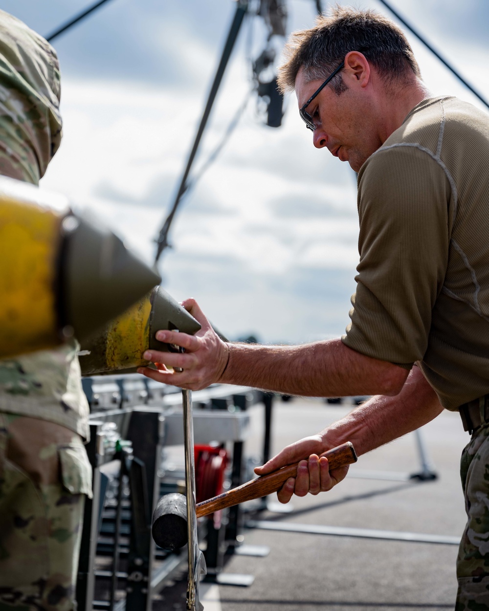 23rd Aircraft Maintenance Unit Aircraft Armament Systems Specialists and 5th Munitions Squadron Munitions Systems Maintenance Specialists Build Munitions