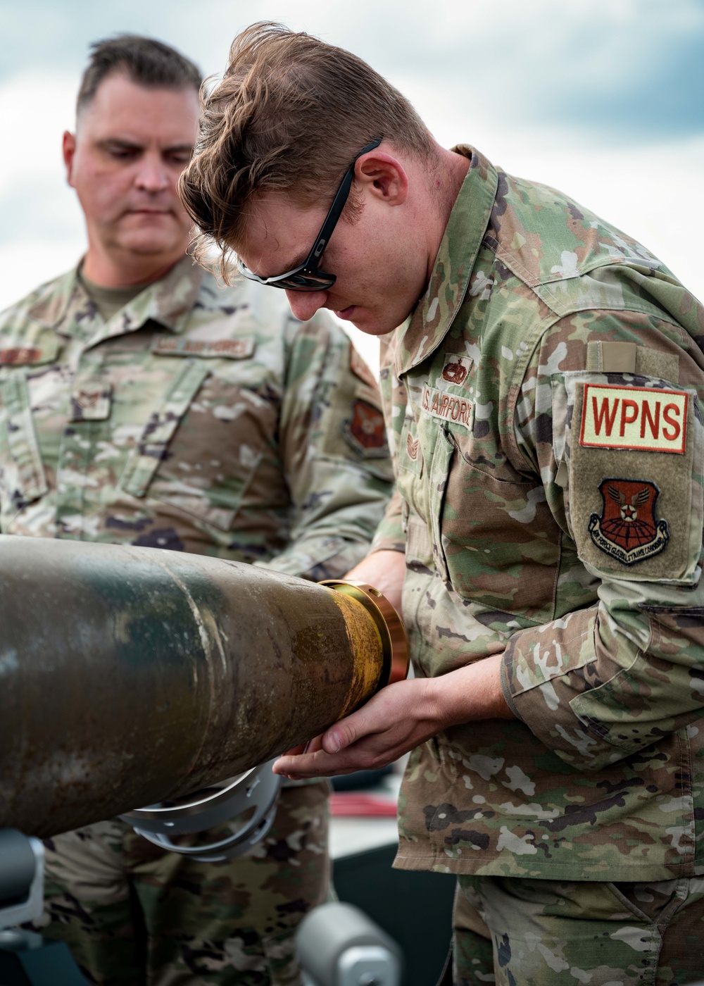 23rd Aircraft Maintenance Unit Aircraft Armament Systems Specialists and 5th Munitions Squadron Munitions Systems Maintenance Specialists Build Munitions